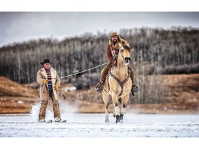 Kirk Prescott practises skijoring with Brad Karl -- both will be competing in this weekend's Skijordue at the Calgary Polo Club. Photo by Leah Hennel/Postmedia.
