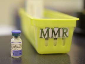 A measles, mumps and rubella vaccine is seen on a countertop at a pediatrics clinic in Greenbrae, Calif. on Feb. 6, 2015.