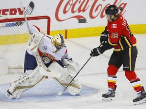Matthew Tkachuk misses this shot on Florida Panthers goalie Roberto Luongo, but the Flames ended up winning the game at the Saddledome on Jan. 11.