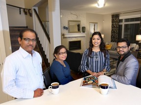 From left, inlaws Hari and Vilas Parmar with Shraddha Penchal and Jayesh Parmar in a NuVista home in Redstone. “There are only a few new communities in the northeast where we’d find a place to build the house we wanted,” Penchal says.