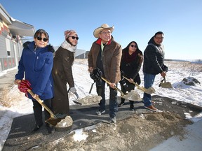 Tsuut'ina Chief Lee Crowchild (centre) joins political and school board officials for a sod-turning ceremony on Wednesday, Feb. 6, 2019, for a new high school, expected to open 2020.