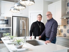 Melanie and Jim  Skalk in the show suite at Walden Place.