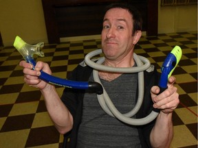 Rick Gerrard (Simon Larter) assessing another one of his outlandish products – The Toilet Snorkel in the French Kiss Off at Confederation Theatre.