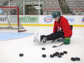 Humboldt Broncos crash survivor Ryan Straschnitzki takes a moment during practice at Winsport in Calgary, on Aug. 7, 2018.