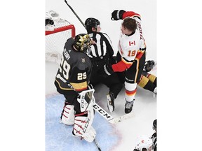 LAS VEGAS, NEVADA - MARCH 06:  Marc-Andre Fleury #29 of the Vegas Golden Knights and Matthew Tkachuk #19 of the Calgary Flames scuffle in the second period of their game at T-Mobile Arena on March 6, 2019 in Las Vegas, Nevada.