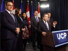 UCP Leader Jason Kenney, centre, stands with his leadership team, including Jason Nixon, far left, in Edmonton Alta, on Oct. 30, 2017.