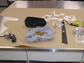 Drugs, cash and weapons were discovered by police after searching a home in Erin Woods. Supplied photo