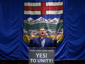 Brian Jean gives a speech after it was announced that the Wildrose party had voted in favour of uniting with the Progressive Conservatives in Red Deer on July 22, 2017.