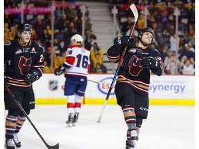Sniper Kaden Elder, right, and the Calgary Hitmen face the Lethbridge Hurricanes in the first round of WHL playoffs. Postmedia file photo