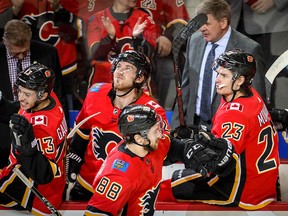 Calgary Flames Andrew Mangiapane celebrates with teammates after scoring against the Vegas Golden Knights in NHL hockey at the Scotiabank Saddledome in Calgary on Sunday, March 10, 2019. Al Charest/Postmedia