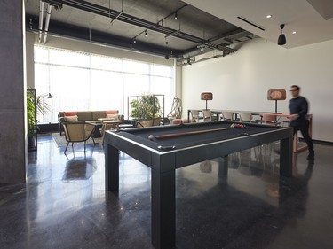 The lobby includes a billiards table and comfortable seating area.