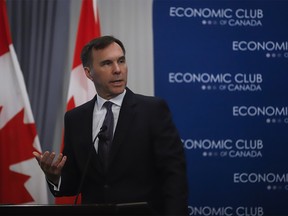 Federal Finance Minister Bill Morneau speaks to the Economic Club of Canada about the federal budget in Calgary, Alta., Monday, March 25, 2019.THE CANADIAN PRESS/Jeff McIntosh ORG XMIT: JMC107