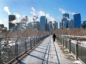 Stream rises from the downtown skyline on another frigid start to the day in the city.  Gavin Young/Postmedia