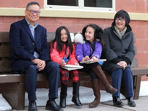 Wayne and Eleanor Chiu hang out with students from St. Patrick's School who were taking part in a week-long Stampede School on Tuesday, March 12, 2019. The Chiu family is making an endowment to the Calgary Stampede's educational programs.