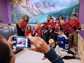 Minor hockey league players helped with the official unveiling of recent renovations at the Foothills Hospital adolescent mental health units on Wednesday March 20. The Smilezone Foundation, a Canadian organization co-founded by former NHL player Adam Graves, fully funded the upgrades which have created brighter, more welcoming spaces for young patients and their families. Gavin Young/Postmedia