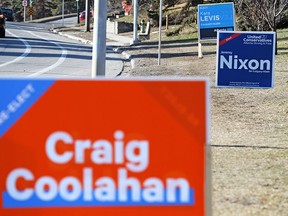 Provincial election signs along 10th street N.W. in the Calgary-Klein riding were photographed on Saturday, March 30, 2019.