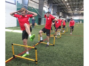 Cavalry FC forward Oliver Minatel (L), from Sao Paulo, Brazil, leads a group of players in Calgary during day one of the Canadian Premier League team's inaugural training camp on Monday, March 4, 2019.  Jim Wells/Postmedia