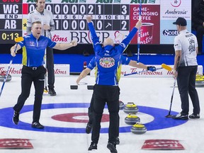 Team Alberta skip Kevin Koe celebrates his team's win following the final rock at the Brier in Brandon, Man. Sunday, March 10, 2019.