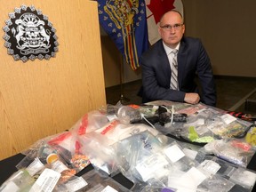 Acting Staff Sergeant Sean Sherman of the District 4 General Investigations Unit speaks to media as The Calgary Police Service has charged three people and seized approximately $75,000 worth of drugs as a result of an investigation targeting methamphetamine dealers in Calgary on Wednesday, March 20, 2019. Darren Makowichuk/Postmedia