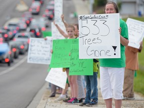 Area residents protest a proposed development for the former Highland Park golf course on June 30, 2016.