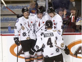 Calgary Hitmen, Carson Focht scores on Kootenay ICE goalie, Jesse Makaj in third period action at the Scotiabank Saddledome as the WHL Hitmen Suited up with Don Cherry to Promote Organ Donation on Sunday March 3, 2019. Darren Makowichuk/Postmedia