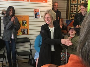 NDP Leader Rachel Notley speaks to supporters at her campaign headquarters in Old Strathcona. An earlier photo op in the riding was cancelled after a yellow vest supporter showed up with a megaphone.