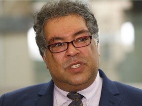 Mayor Naheed Nenshi speaks to reporters following a White Hat ceremony at YYC. Sunday, March 24, 2019. Brendan Miller/Postmedia