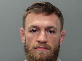 This photo provided by the Miami-Dade Corrections and Rehabilitation Department shows Conor McGregor. Authorities say mixed martial artist and boxer Conor McGregor has been arrested in South Florida for stealing the cellphone of someone who was trying to take his photo. A Miami Beach police report says the 30-year-old McGregor was arrested Monday, March 11, 2019 and charged with robbery and criminal mischief. (Miami Beach Police Department via AP)