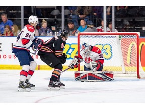 Hurricanes 3 Hitmen 2 OT at the ENMAX Centre. photos by Erica Perreaux