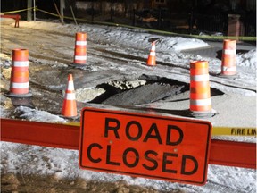 The city has blocked off a stretch of Crescent Road Road at 4th Street N.W. after a sink hole opened up on Wednesday, March 13, 2019.