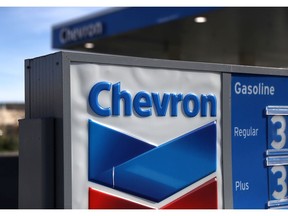 CORTE MADERA, CA - FEBRUARY 02: A sign is posted in front of a Chevron gas station on February 2, 2018 in Corte Madera, California. Chevron reported fourth quarter earnings that missed analyst expectations with profits of $3.11 billion, or $1.64 per share but included a $2.02 billion tax benefit from the recent federal tax cuts that reduced the per share price to 73 cents a share. The pre-tax benefit earnings were well below analysts expatations of $1.27 a share. (Photo by Justin Sullivan/Getty Images)