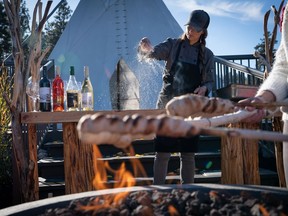 Andrea Callan makes bannock at Red Fox Club. Courtesy of tourismkelowna.com - David McIlvride