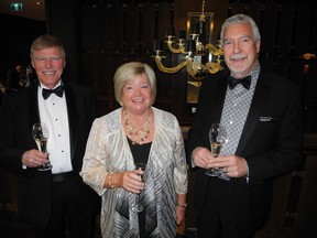 Pictured, from left, at the Calgary Philharmonic Orchestra's Cork and Canvas Winemaker's Dinner held April 5 at the Petroleum Club are Big Muddy Exploration president Roger Smith and his wife Lorna with CPO president and CEO Paul Dornian. The  gala was the most successful Cork and Canvas to date raising $125,000 and counting.