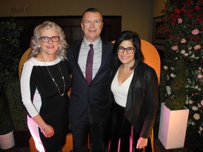 Pictured at the 20th anniversary of An Evening of Vehicles and Violins Gala are, from left: Calgary Motor Dealers Association vice-president Cindy Clark with Jim Gillespie, show manager, 2019 Calgary International Auto & Truck Show and Alberta Children's Hospital Foundation president and CEO Saifa Koonar. The foundation was the recipient of funds raised this night.