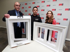 Adam Loria, EMS public education officer centre, demonstrated window retrofits to help prevent child falls with the city's chief building officer Marco Civitarese, left and  Dr. Michelle Simonelli, pediatric emergency physician at Alberta Children's Hospital at City Hall on Wednesday April 10, 2019. Officials also announced new building code initiatives to make windows safer. Gavin Young/Postmedia