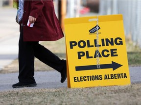 Voters in the Calgary-Mountainview riding vote at Stanley Jones School soon after the polls opened on election day, Tuesday, April 16, 2019.