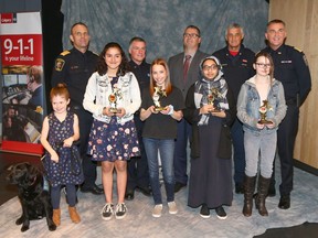 Five youth, from left: Dyllan Domagala, Laura Campos, Emilina Kachuk, Maryam Yasir and Emily Moreton were honoured at the 9-1-1 Heroes Awards ceremony at Telus Spark in Calgary on Friday, April 12, 2019.