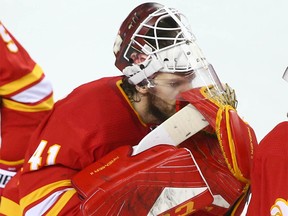 A dejected Mike Smith joins players at the end of game five between the Colorado Avalanche and Calgary Flames in Calgary on Friday, April 19, 2019. Flames lost 5-1. Jim Wells/Postmedia