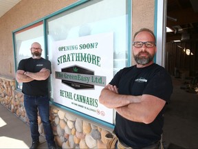 Bill Evans (L) and Wes Breault stand in the work in progress retail store in Strathmore, east of Calgary on Wednesday, April 24, 2019. Breault and his partner pay $3,000 a month to lease their pot retail outlet, although they have not yet been approved to sell due to the supply shortage. Jim Wells/Postmedia