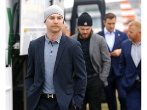 Calgary Flames, Sam Bennett and teammates head to the bus at the Calgary Airport on their way to game 3 against the Colorado Avalanche for the NHL Play-Offs in Calgary on Sunday, April 14, 2019. Darren Makowichuk/Postmedia