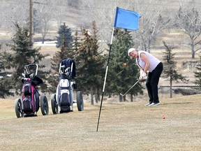 Golfers were all smiles as the Fox Hollow Golf course is open for the season in Calgary on Wednesday, April 3, 2019.