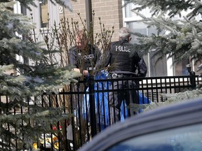 Calgary police investigate the scene at the residence of Jasmine Lovett in Cranston on Sunday, April 28, 2019.