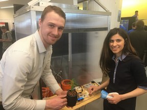Dan Carruthers and Nilou Ghazavi, a part of the Team Grower, pose for a photo with their project called Cannabis Greenhouse during the 2019 Engineering Design Fair at the Schulich School of Engineering. The Cannabis Greenhouse is an all-in-one marijuana grower, purpose-built for outdoor use. Supplied photo
