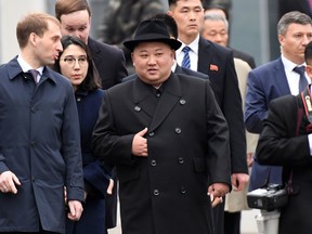 North Korean leader Kim Jong Un walks upon arrival at the railway station in the far-eastern Russian port of Vladivostok on April 24, 2019.