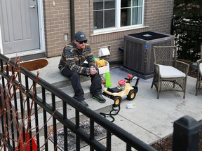 Robert Leeming sits outside his Cranston townhouse on Monday, April 29, 2019 after police had spent several days investigating the residence. Leeming is the primary suspect in the disappearance of Jasmine Lovett and her 22-month-old daughter Aliyah Sanderson.