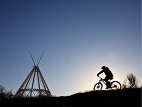 Biking the Sunrise Trail by the Saamis Teepee in Medicine Hat. Courtesy, Andrew Penner