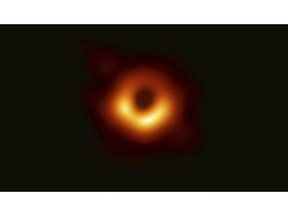 This image released Wednesday, April 10, 2019, by Event Horizon Telescope shows a black hole. Scientists revealed the first image ever made of a black hole after assembling data gathered by a network of radio telescopes around the world. (Event Horizon Telescope Collaboration/Maunakea Observatories via AP)