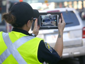 The Calgary Parking Authority have been writing more tickets then ever this spring in Calgary on Tuesday, April 23, 2019. Darren Makowichuk/Postmedia