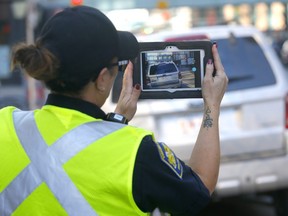 The Calgary Parking Authority have been writing more tickets then ever this spring in Calgary on Tuesday, April 23, 2019. Darren Makowichuk/Postmedia