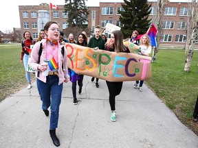 Students at Western Canada High School in Calgary walk out of class during a GSA show of support on Friday, May 3, 2019.